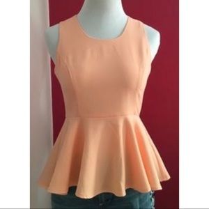 Pale pink peplum tank top